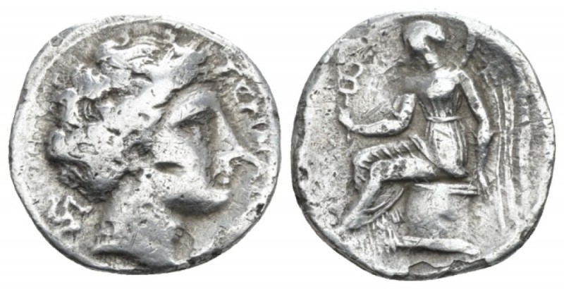 Bruttium, Terina Drachm circa 300, AR 16mm., 2.00g. Head of nymph r.; triskeles ...