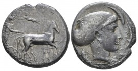 Sicily, Syracuse Tetradrachm circa 420, AR 26mm., 16.82g. Slow quadriga driven r. by charioteer holding reins and kentron; in field above, Nike flying...