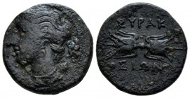 Sicily, Syracuse Bronze circa 317-289, Æ 20mm., 6.19g. Bust of Artemis l., holding quiver. Rev. Winged thunderbolt. SNG ANS 1395. Calciati 140.

Dar...