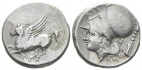Acarnania, Anactorion Stater circa 320-280, AR 21mm., 8.45g. Pegasus flying l.; below, AN. Rev. Head of Athena l., wearing Corinthian helmet; behind n...