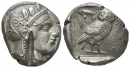 Attica, Athens Tetradrachm circa 420-385, AR 25mm., 17.06g. Head of Athena, wearing crested helmet decorated with olive leaves and spiral palmette. Re...