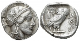 Attica, Athens Tetradrachm circa 420-410, AR 25mm., 17.18g. Head of Athena r., wearing Attic helmet decorated with olive leaves and palmette. Rev. Owl...