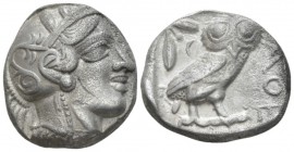 Attica, Athens Tetradrachm circa 365-359, AR 23mm., 16.58g. Head of Athena r., wearing crested helmet decorated with olive leaves and spiral palmette....