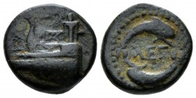 Megaris, Megara Bronze after 307 BC, Æ 15mm., 3.02g. Prow l.; tripod on forecastle. Rev. MEΓ between two dolphins. BMC Attica 21. SNG Copenhagen 480....