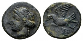 Caria, Halicarnassus Bronze Mid IV-III cent., Æ 12mm., 1.11g. Laureate head of Apollo l. Rev. Eagle standing l.; kithara in l. field. SNG Copenhagen 3...