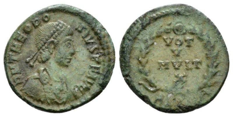 Theodosius I, 379-395 Æ4 Siscia circa 379-383, Æ 15mm., 1.60g. Pearl-diademed, d...