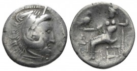 Celtic, imitation of Philip III Drachm II century BC, AR 16mm., 3.33g. Head of Heracles r., wearing lion skin headdress. Rev. Zeus seated l., holding ...