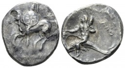 Calabria, Tarentum Nomos circa 280-272 BC, AR 20mm., 6.28g. Warrior on horseback l., holding shield and two spears. Rev. Oecist riding dolphin l., hol...