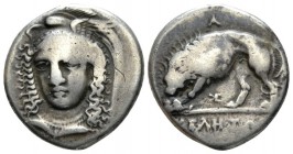 Lucania, Velia Nomos circa 334-300, AR 20mm., 7.33g. Head of Athena facing slightly l., wearing winged and crested Phrygian helmet. Rev. Lion standing...