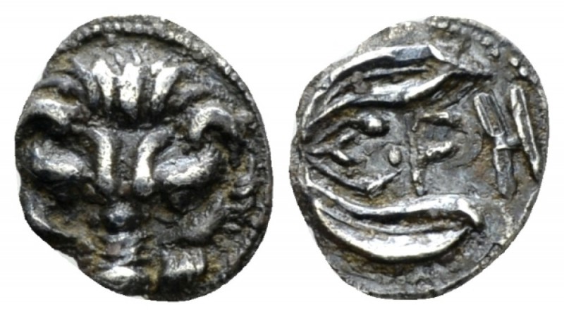 Bruttium, Rhegium Litra circa 425-420, AR 10mm., 0.64g. Facing lion's mask. Rev....