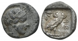 Attica, Athens Drachm circa 454-404, AR 16mm., 3.91g. Helmeted head of Athena r., with frontal eye. Rev. Owl standing r., head facing; olive sprig and...