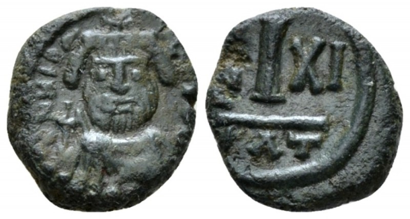 Heraclius, 610-641. Decanummium Catania circa 620-621, Æ 14mm., 2.80g. Facing bu...