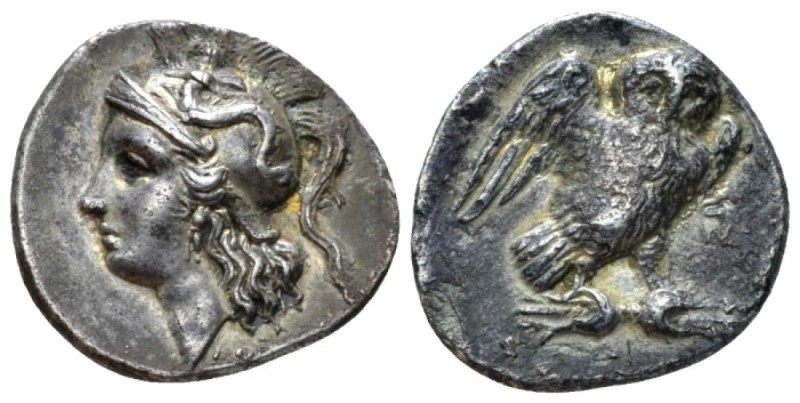 Calabria, Tarentum Drachm circa 280-272, AR 20mm., 3.08g. Head of Athena l., wea...