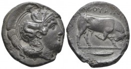 Lucania, Thurium Di-nomos circa 410-400, AR 27mm., 14.76g. Head of Athena r., wearing crested Attic helmet decorated with Scylla scanning and neck gua...