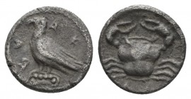 Sicily, Agrigentum Litra circa 413, AR 10mm., 0.56g. Eagle standing l., on Ionic capital, with closed wings. Rev. Crab. SNG Ashmolean 1673. SNG ANS 99...