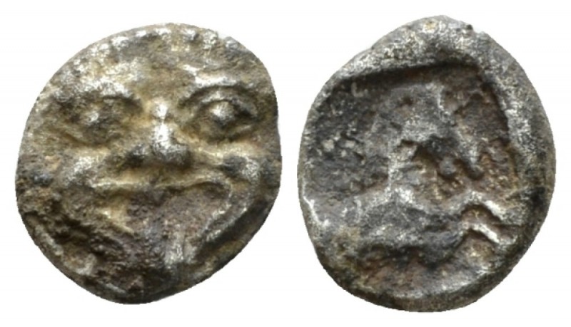 Asia Minor, Uncertain mint Fraction VI century BC, AR 8mm., 0.82g. Gorgoneion fa...