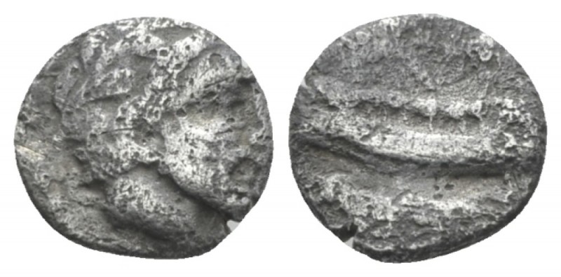 Phoenicia, Aradus Obol circa 400-350, AR 8mm., 0.69g. Laureate head of Marine de...