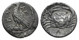 Sicily, Agrigentum Litra circa 450-440, AR 9.2mm., 0.55g. Eagle standing l., on Ionic capital, with closed wings. Rev. Crab; below, ΛΙ. SNG Ashmolean ...
