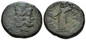 Sicily, Catana Bronze after 212, Æ 20mm., 12.68g. Janiform head of Serapis; three monograms around. Rev. Demeter standing l. holding grain ear and tor...