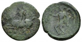 Sicily, Himera Tetras circa 425-409, Æ 15mm., 2.26g. Nude rider on a goat l., blowing into conch; three pellets below. Rev. Nike advancing l., holding...