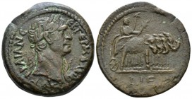 Egypt, Alexandria. German. Trajan, 98-117 Drachm circa 111-112 (year 15), Æ 32.6mm., 20.10g. Laureate bust r., wearing aegis. Rev. The Emperor standin...