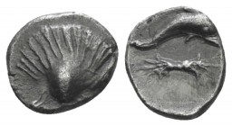 Calabria, Tarentum Obol (?) circa 325-280, AR 10mm., 0.60g. Shell. Rev. Dolphin swimming r.; below, thunderbolt. Vlasto 1506. Historia Numorum Italy 9...