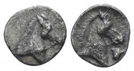 Calabria, Tarentum Three-quarter obol circa 325-280, AR 9mm., 0.3g. Head of horse r. Rev. Head of horse r.; in r. field, bucranium (?). Vlasto 1712. H...