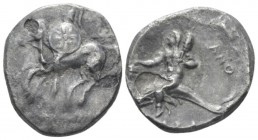 Calabria, Tarentum Nomos circa 280-272 BC, AR 20mm., 6.28g. Warrior on horseback l., holding shield and two spears. Rev. Oecist riding dolphin l., hol...