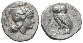 Calabria, Tarentum Drachm circa 280-272, AR 16mm., 2.80g. Head of Athena r., wearing Attic helmet decorated with Scylla and Z. Rev. Owl standing l. on...