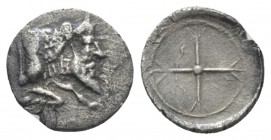 Sicily, Gela Obol circa 480-470, AR 10mm., 0.43g. Forepart of man-headed bull r. Rev. Four-spoked wheel. Jenkins, Gela 194. SNG Copenhagen 259. Traces...