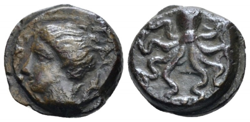 Sicily, Syracuse Tetras circa 425-410, Æ 13mm., 3.17g. Head of Arethusa l.; dolp...