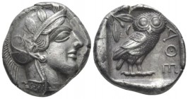 Attica, Athens Tetradrachm circa 440-430, AR 23mm., 17.14g. Head of Athena r., wearing crested helmet, earring and necklace; bowl ornamented with spir...