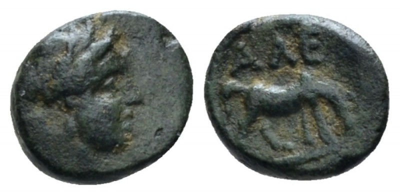 Troas, Alexandreia Bronze circa 300, Æ 8.20mm., 0.65g. Laureate head r. Rev. Hor...