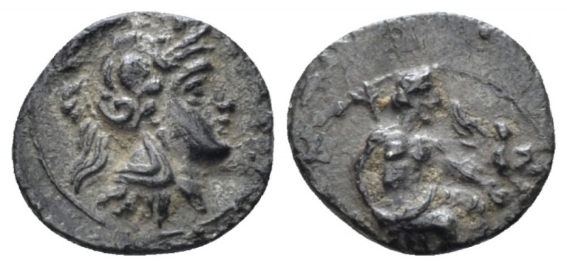 Cilicia, Uncertain Obol IV cent., AR 10mm., 0.66g. Baaltars seated r., holding e...