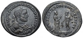 Diocletian, 284-305 Follis Ticinum circa 305, Æ 29mm., 10.43g. Laureate bust r., wearing imperial mantle and holding olive-branch in r. hand and mappa...