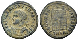 Crispus caesar, 317-326 Follis Antiochia circa 325-326, Æ 19mm., 2.64g. Laureate and cuirassed bust l. Rev. Camp gate with two turrets, one star above...