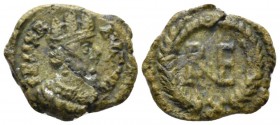 The Ostrogoths. Theoderic, 493-526. 10 Nummi Ravenna circa 493-526, Æ 17mm., 2.71g. Crowned and draped bust of Ravenna r. Rev. Monogram of Ravenna wit...