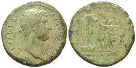 Hadrian, 117-138 Sestertius circa 130-138, Æ 33mm., 20.75g. Laureate head r. Rev. Hadrian standing r. on low platform with soldier, holding scroll and...