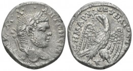 Caracalla, 198-217 Tetradrachm Laodicea ad Mare circa 215-217, AR 24.9mm., 14.00g. Laureate head r. Rev. Eagle, holding wreath in beak, standing facin...