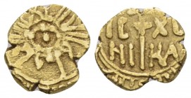 Palermo, The Normans in South Italy and Sicily. William I, 1154-1156. Tari' circa 1154-1156, AV 11.4mm., 1.46g. Sp. 88. MIR 32 (Messina). MIN 286.

...