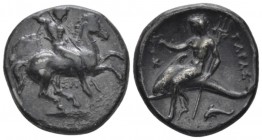 Calabria, Tarentum Nomos circa 315-300, AR 21mm., 7.76g. Naked ephebus on horse prancing r., holding reins, shield and two spears in l. hand and strik...