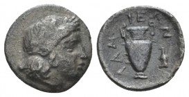 Thessaly, Lamia Obol circa 400-350, AR 11mm., 0.67g. circa 400-350, AR 11mm, 0.67g. Head of young Dionysos r., wearing ivy wreath. Rev. ΛΑM l. up, ΙΕΩ...