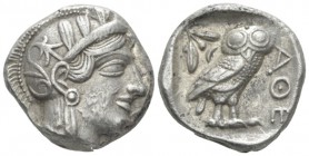 Attica, Athens Tetradrachm circa 440-430, AR 23mm., 17.16g. Head of Athena r., wearing crested helmet, earring and necklace; bowl ornamented with spir...