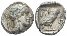 Attica, Athens Tetradrachm circa 440-430, AR 23mm., 17.18g. Head of Athena r., wearing crested helmet, earring and necklace; bowl ornamented with spir...
