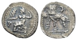 Cilicia, Uncertain mint Obol IV cent., AR 10mm., 0.52g. Baaltars seated l., resting on sceptre, holding ear of corn and bunch of grapes. Rev. Forepart...