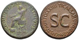 Tiberius, 14-37 Sestertius circa 22-23, Æ 35mm., 25.49g. Tiberius laureate, seated l., foot on stool, holding patera and sceptre. Rev. TI CAESAR DIVI ...