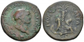 Vespasian, 69-79 Sestertius circa 71, Æ 35mm., 25.67g. Laureate head r. Rev. Jewess seated r. on cuirass under palm-tree in attitude of mourning; behi...