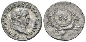 Divus Vespasianus. Denarius circa 80-81, AR 18mm., 3.10g. Laureate head r. Rev. Two capricorns, back to back, supporting shield; below, globe. C 497. ...