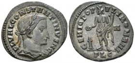 Constantine I Caesar, 306-307. Follis Lugdunum circa 307, Æ 26mm., 7.58g. Laureate and draped bust r. Rev. Genius standing l., holding patera and corn...