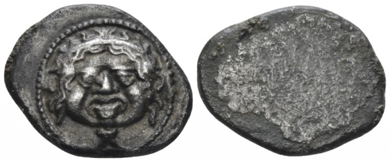 Etruria, Populonia 10 Units circa 425-400, AR 23.5mm., 7.97g. Diademed facing he...